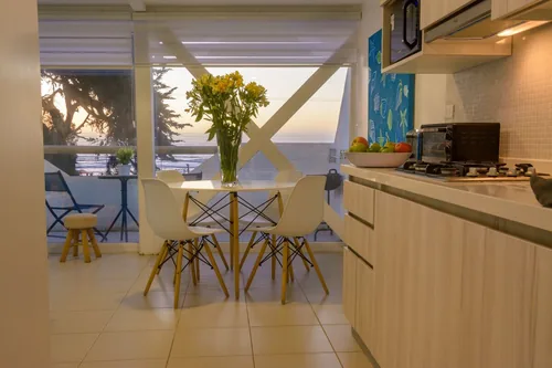 Comedor y cocina americana del Departamento 3